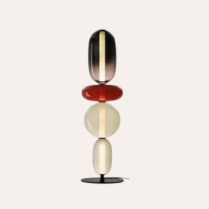 Lampe de table goodlampe au design italien composée de sphères en verre coloré empilées sur une base en métal noir
